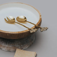 A set of 2-piece salad servers bee