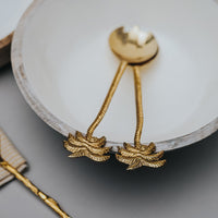 A set of Salad Servers with palm tree motif