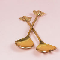 A set of 2-piece salad servers bee
