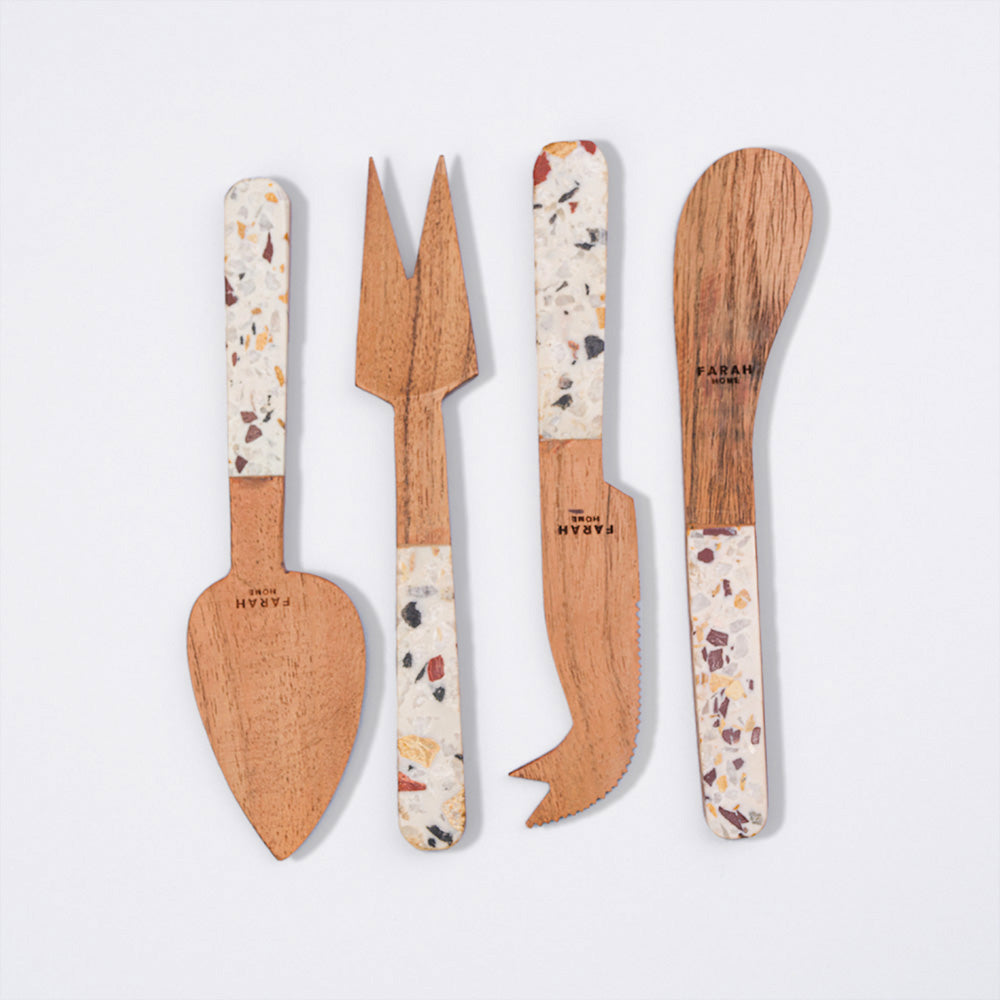 A set of wood cheese knives with terrazzo handle