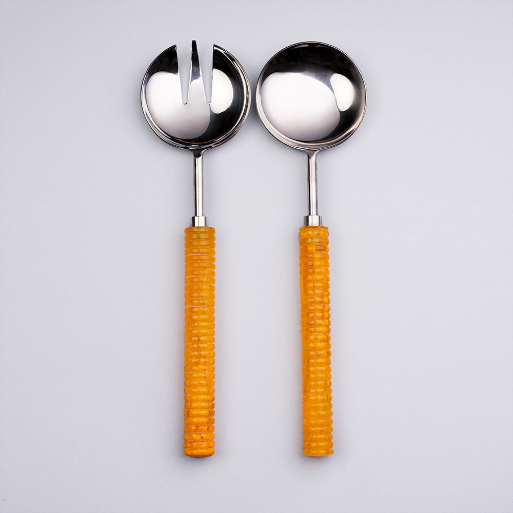 A set of Salad Servers with orange handles